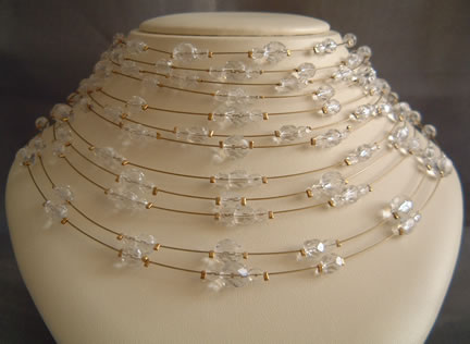 12 Strand graduated choker necklace on silver illusion wire